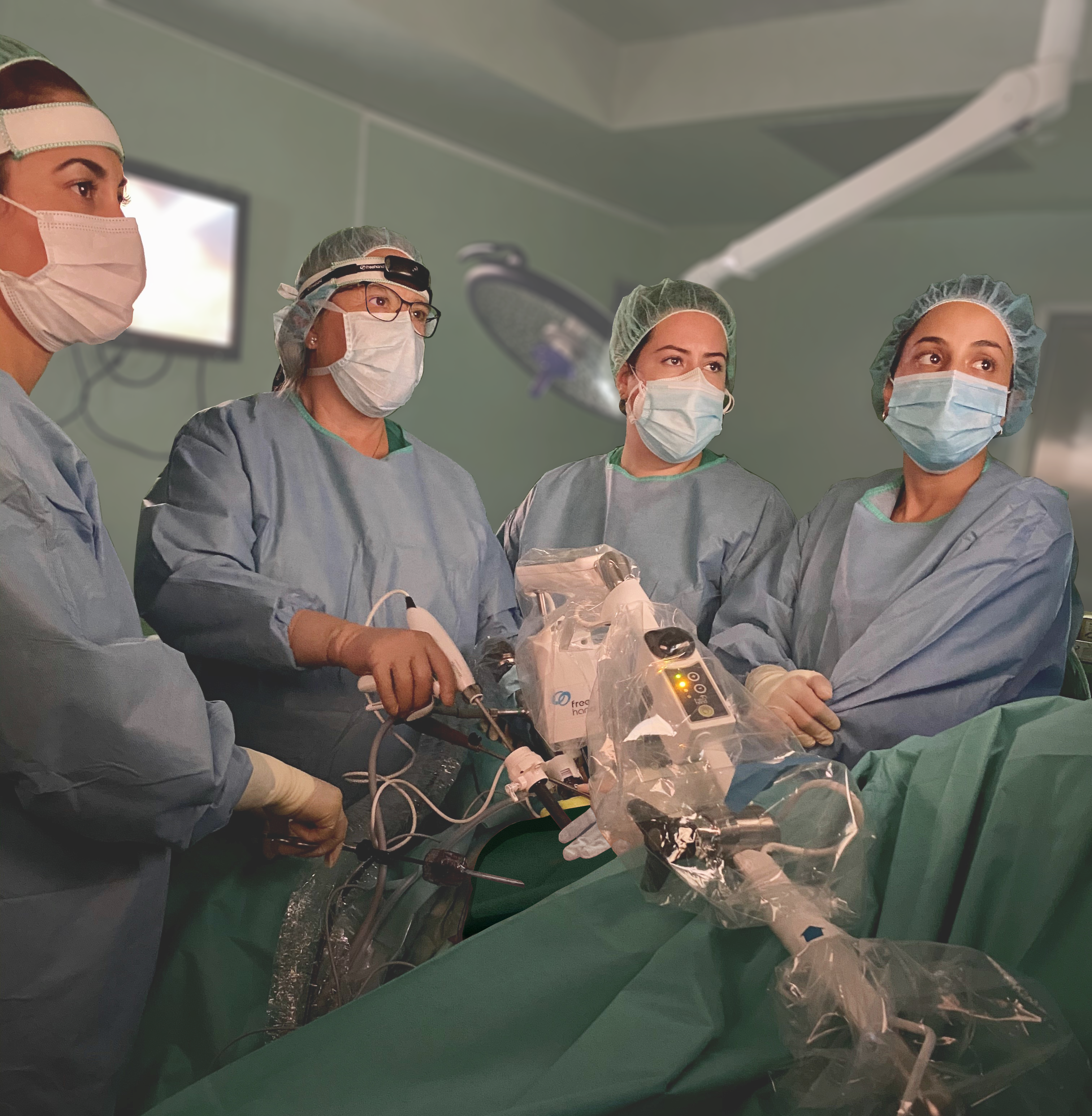 Surgical team performing a robot assisted operation