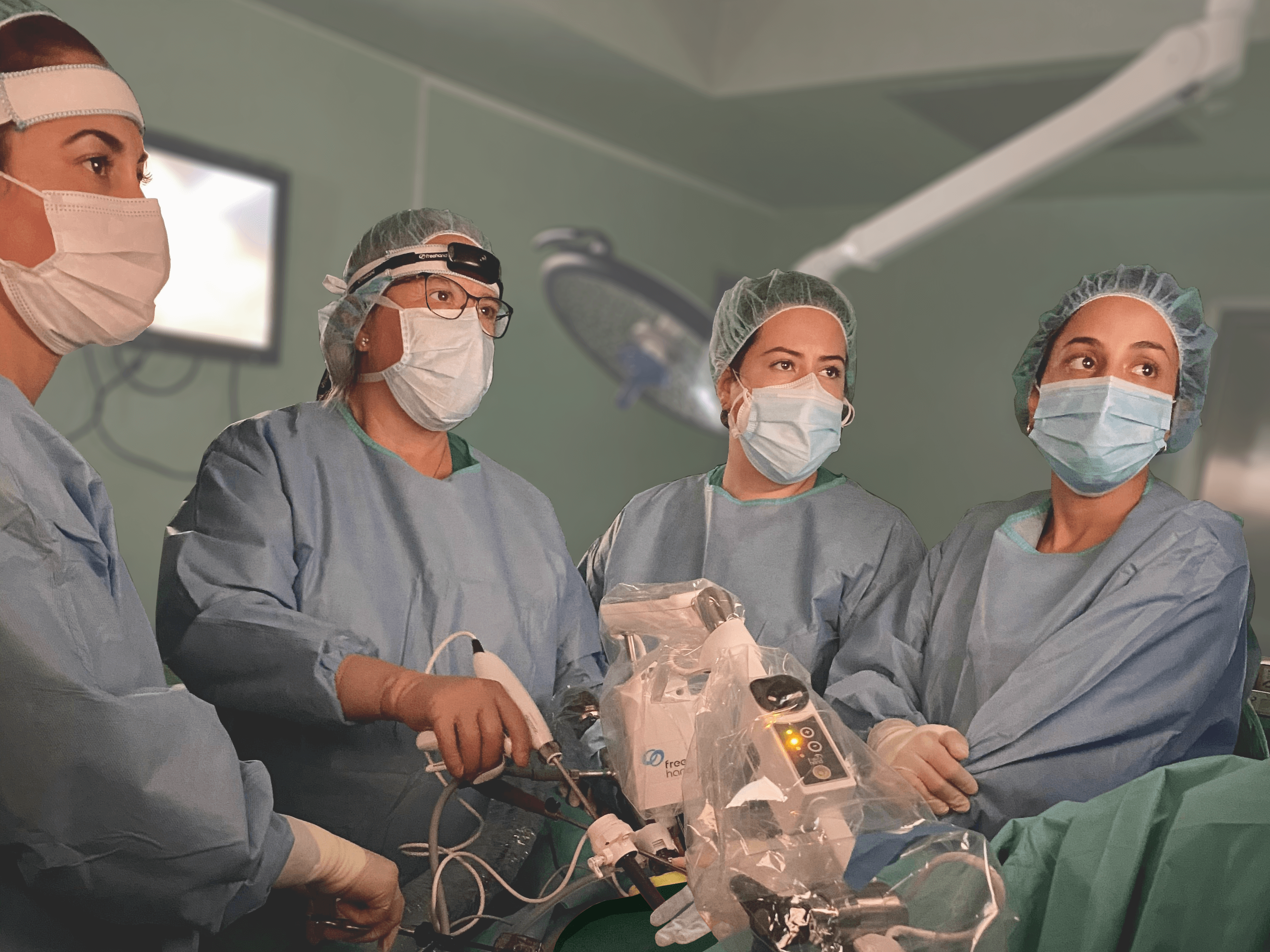 Surgical team performing a robot assisted operation